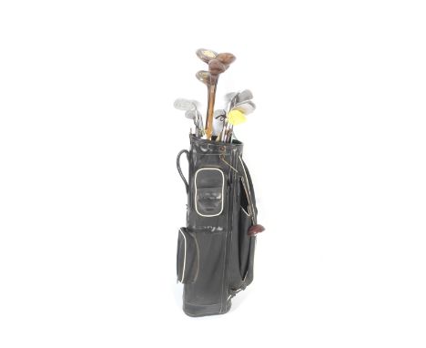 A collection of vintage golf clubs and golf bag. Comprising a driver and woods with bamboo shafts and brass base plates stamp