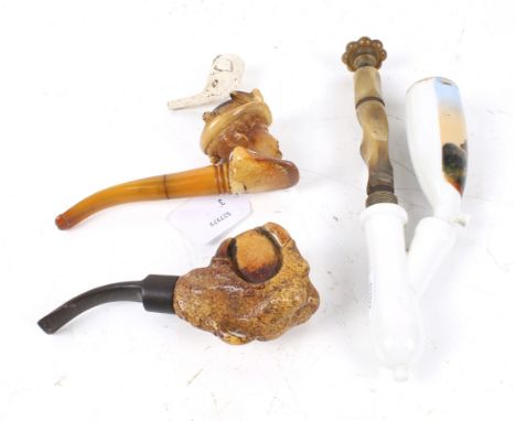 A group of four assorted vintage tabacco pipes. Including two meerschaum, a china and carved horn plus the bowl of a clay pip