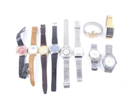 A collection of of gentleman's vintage wrist and bracelet watches. Including a 1970s Ruhla with a red dial and other examples