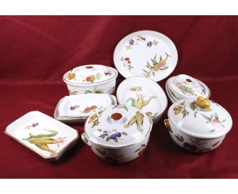 A collection of Royal Worcester Evesham serving tableware. Including two tureens, two lidded vegatable dish and oval souffle 