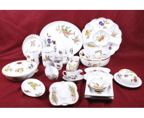 A collection of Royal Worcester Evesham serving tableware. Including a circular tureens, napkin rings, egg cups, a gravy boat