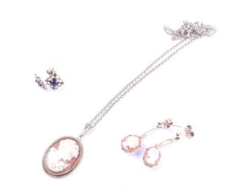 A vintage 9ct gold and oval shell cameo pendant. Hallmarks for Birmingham 1979, hung from a fine belcher chain; together with