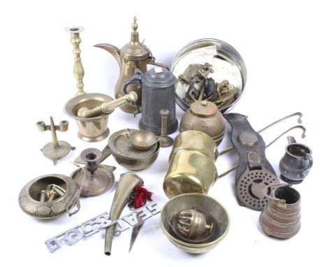 An assortment of vintage brass, copper and pewter items. Including James Dixon & Sons pewter tankard, a brass pestle and mort