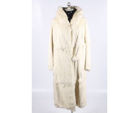 A vintage long white rabbit fur coat. With a shawl collar and two clip fastening, lined in cream fabric, L115cm x shoulder W4