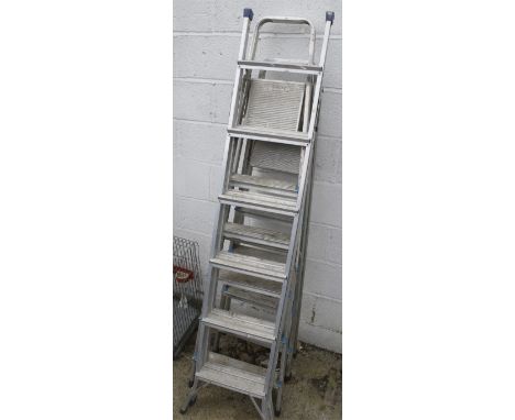 Three sets of aluminium step ladders. Including Beldray, etc.