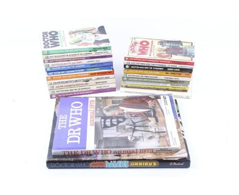 A collection of assorted vintage Dr WHO collectables. Including a Dalek Rolykins by Marx (boxed), books, etc. 