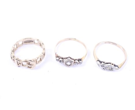 Three vintage gold rings. comprising; a platinum-flashed gold and small graduated diamond three stone ring, stamped '9ct Plat