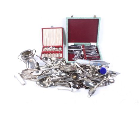 An assortment of 19th century and later flatware. Comprising stainless steel and silver plate, including knives, forks, spoon