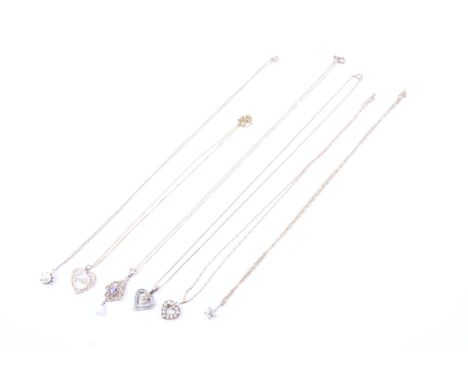 Six vintage 9ct gold and gem set pendants and chains. Including a cultured freshwater pearls; an open hear and four-leaf clov