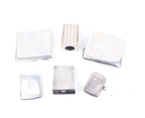 A collection of smoking related items to include two engine turned cigarette cases. Hallmarks for Birmingham 1921 and 1925; t
