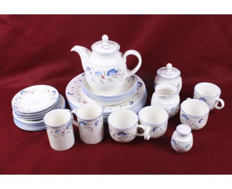 A Royal Doulton Expressions Windermere tea service. Including tea pot, sugar, milk jug, four cups and saucers, etc. Max. H19c