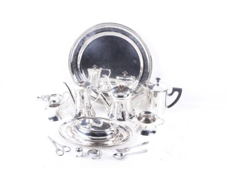 A collection of silver-plate including a beaded round tray with an engraved Greek-key band. Together with a Joseph Rodgers & 