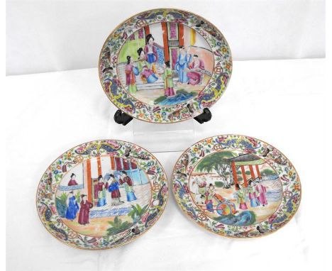 A Chinese famille rose plate, decorated figures in enamel colours 20cm diameter and two similar (3) Condition Report plate to