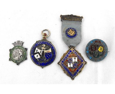 A Royal Masonic Institution for Boys silver and enamel medallion, another similar, a silver and enamel medal and an enamelled