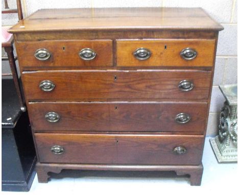 An early 19th century oak chest, with two short and three graduated long drawers, on bracket feet, 106cm wide. 
