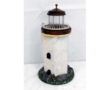 A 1920's novelty table lamp, in the form of a lighthouse 51cm high 