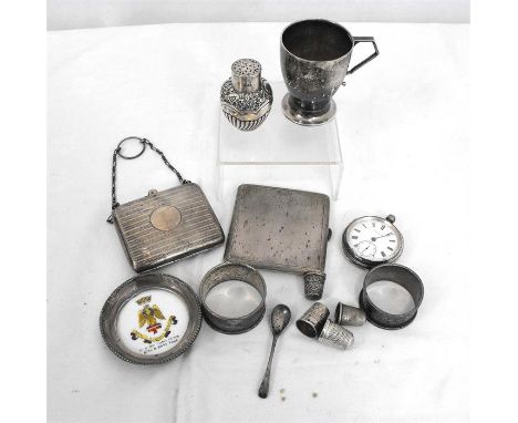 A Victorian silver pounce pot, London 1899, 6cm high; a silver cigarette case; a silver purse; a silver mug and other silver 