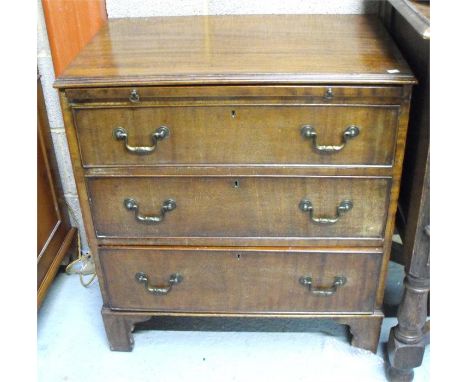 A 20th century George III style mahogany bachelors chest, the brushing slide above 3 graduated long drawers, standing on brac