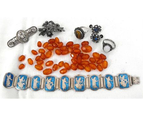 A quantity of silver and other jewellery including a jade opal set ring, Marcasite brooch and a Siam bracelet.