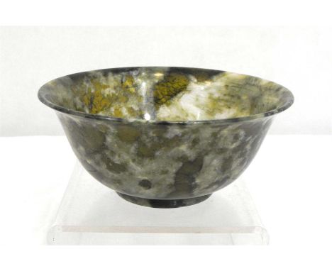 A Chinese spinach jade bowl, 13cm diameter.