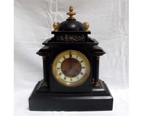 A Victorian black slate mantle clock, the enamel dial with Roman numerals, 28cm by 36cm.