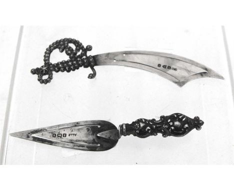 A Charles Horner silver bookmark in the form of a scimitar, Chester 1897 and 8.5cm long; together with another in the form of