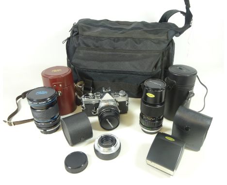 Olympus OM-2 SLR camera with 50mm lens, Olympus 75-150mm lens, Carl Zeiss Jena 28-70mm macro lens and other related camera eq