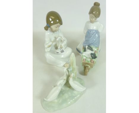 Nao figurine with puppy, another Nao figurine with lamb and Nao ducks (3)   Condition Report   Click here for further images,