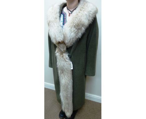 Vintage full length coat with fox fur collar and quilted lining, by Marshall and Snelgrove    Condition Report   Click here f