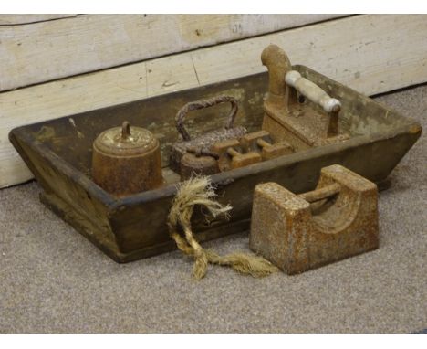 Wooden food trough and various weights and irons
