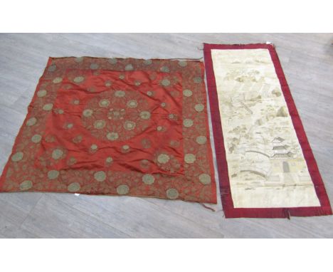 Two Chinese silk textiles, russet silk with an all over gold metal thread hand embroidered floral design and a cream hand emb