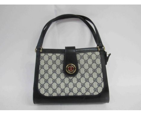 GUCCI  BREVETTATO GG vintage monogram double handle handbag. This 1970's collectable bag is a true testament to this iconic b