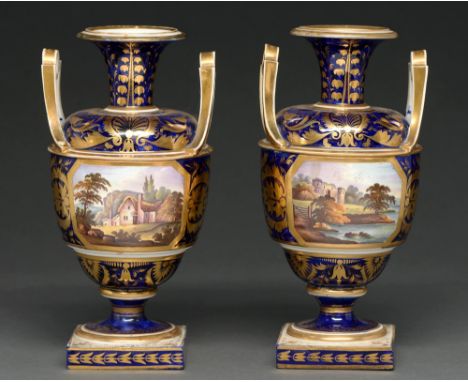 A pair of Derby vases, c1830, painted with a landscape with cottage or ruined castle in octagonal gilt frame reserved on a ri