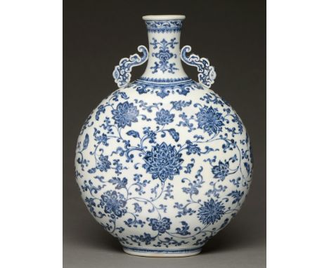 A Chinese blue and white moon flask, painted in the manner of 'heaping-and-piling' with lotus meander, 34cm h  Good condition