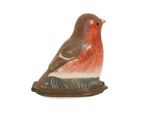 A South Staffordshire enamel patch box in the form of a bird, late 18th c,&nbsp; the lid painted with a rose, steel mirror to