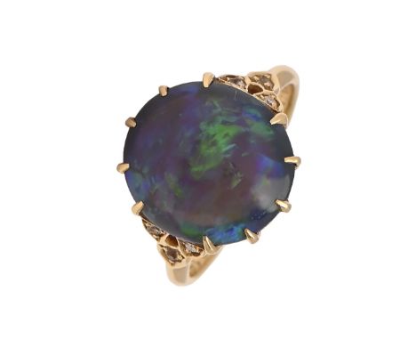 A black opal and diamond ring, in gold, marked 18ct and stamped with an inventory number, 4.4g, size M  Good condition