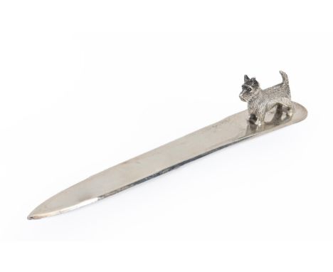 A George V silver dog novelty letter knife, with terrier handle, 14.8cm l, maker's mark rubbed, Birmingham 1935, 1oz 10dwt  U