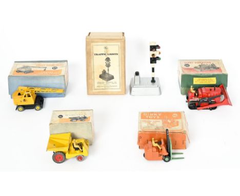 Five Dinky Toys vehicles and accessories, comprising 14C Coventry Climax forklift truck, 561 Blaw Knox bulldozer, 562 dumper 