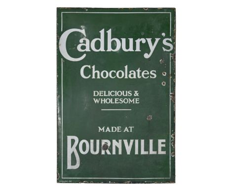 Vintage advertising. A white and green enamelled iron advertisement for Cadbury's Chocolates Delicious &amp; Wholesome made a