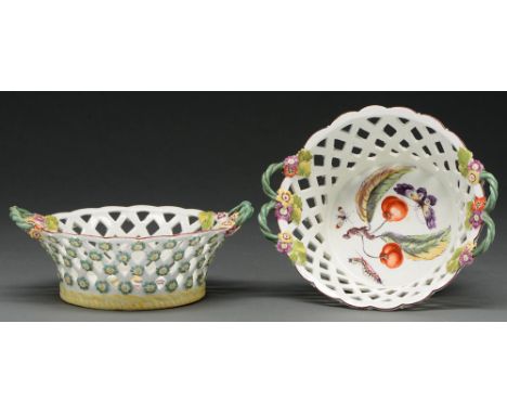 A pair of early Derby reticulated baskets, c 1758, with twin green entwined loop handles issuing from applied flowers, painte