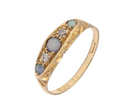 An opal and diamond ring, in 18ct gold, Birmingham 1918, 2.7g, size M  Hoop slightly thin, opals wanting polish