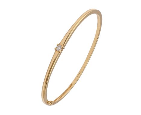A diamond bangle, in 18ct gold, 58mm (internal), marks rubbed, 15g  Light wear scratches but no distortion