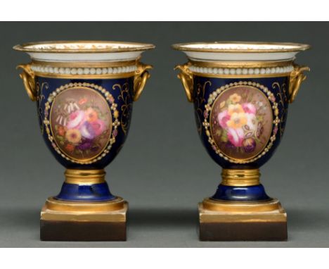 A pair of Flight, Barr &amp; Barr vases, c 1825,&nbsp;with gilt eagle's head and ring handles and painted with an oval floral