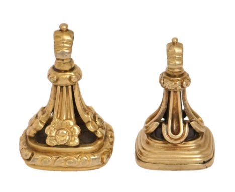 A Victorian gold watch fob seal, with blind cornelian matrix, 31mm h and a larger contemporary gold and base metal example, b