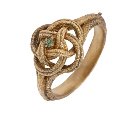 An emerald and diamond knot bangle, late 19th c, in gold coloured metal, 54mm (internal), 28.5g  Good condition