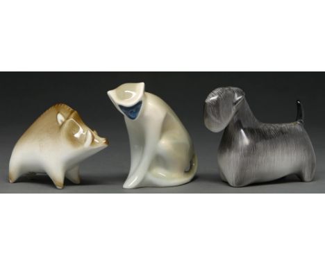 A Cmielow porcelain model of a longhaired dog, a Zsolnay boar and a Royal Dux monkey, 1960s, the last modelled by Jitka Forej