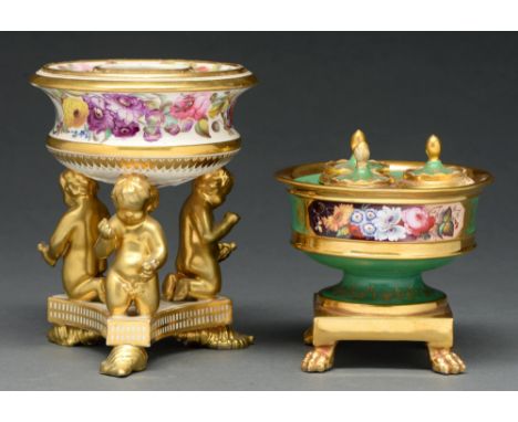 A Derby inkwell, c 1820, the compressed bowl painted with continuous flowers on three gilt kneeling child feet and triform ba
