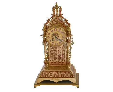 A French Troubadour style gilt brass and red enamel mantle clock, late 19th c, with gong striking movement, 36cm h excluding 