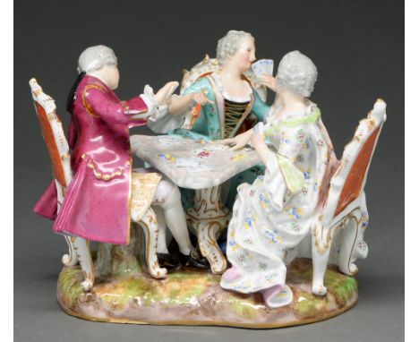 A Meissen group of card players, second half 19th c,&nbsp;in the 18th c taste, each seated at a triangular gaming table, enam