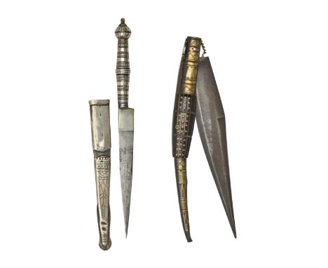 A Spanish fighting knife, Navarja, late 19th c, with brass and horn scales, 47cm overall and a South American silvered metal 